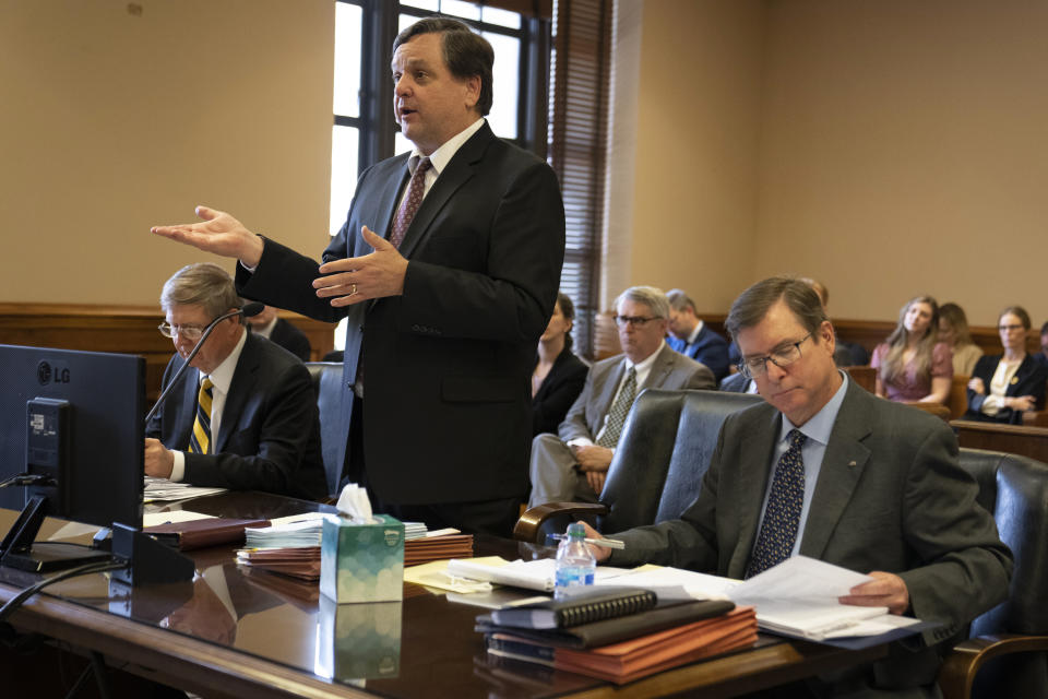 Attorney John Harris, center addresses the court with attorneys Doug Pierce, left and Robb Harvey, right, during a status hearing in Chancellor I'Ashea L. Myles courtroom Monday, May 22, 2023, in Nashville, Tenn. The attorneys represent clients wanting the release of records in The Covenant School shooting case. (AP Photo/George Walker IV)