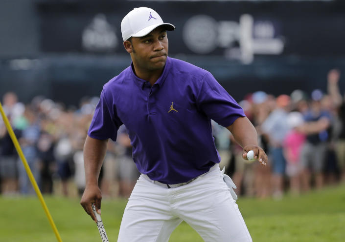 Harold Varner III reacts after sinking a putt for birdie on the first green during the final round of the PGA Championship golf tournament, Sunday, May 19, 2019, at Bethpage Black in Farmingdale, N.Y. (AP Photo/Seth Wenig)