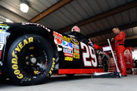 MARTINSVILLE, VA - OCTOBER 28: Kevin Harvick, driver of the #29 Budweiser Chevrolet, stands in the garage prior to practice for the NASCAR Sprint Cup Series TUMS Fast Relief 500 at Martinsville Speedway on October 28, 2011 in Martinsville, Virginia. (Photo by Jared C. Tilton/Getty Images)