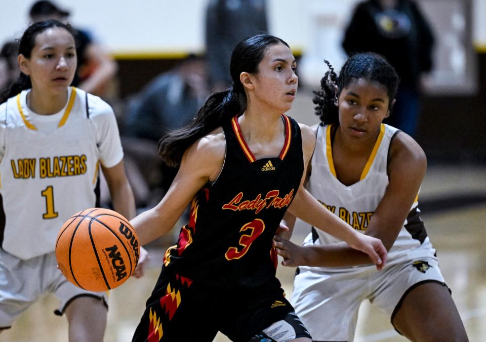 Tulare Union's Jocelynn Melendez passes away from Golden West's Tie Morgan in a non-league girls basketball game on Thursday, December 14, 2023.