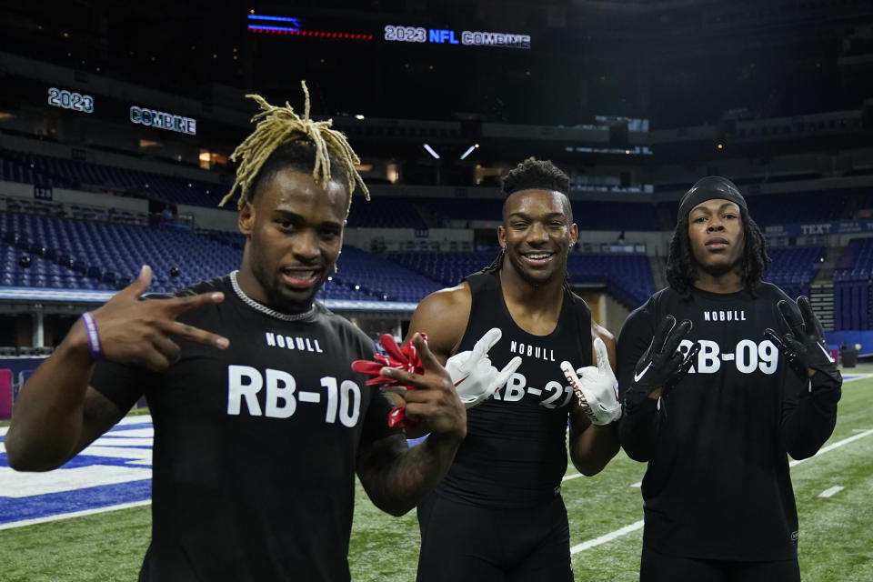 FILE - Oklahoma running back Eric Gray, left, Texas running back Bijan Robinson, center, and Alabama running back Jahmyr Gibbs pose for a photo after completing their drills at the NFL football scouting combine in Indianapolis, Sunday, March 5, 2023. (AP Photo/Erin Hooley, File)