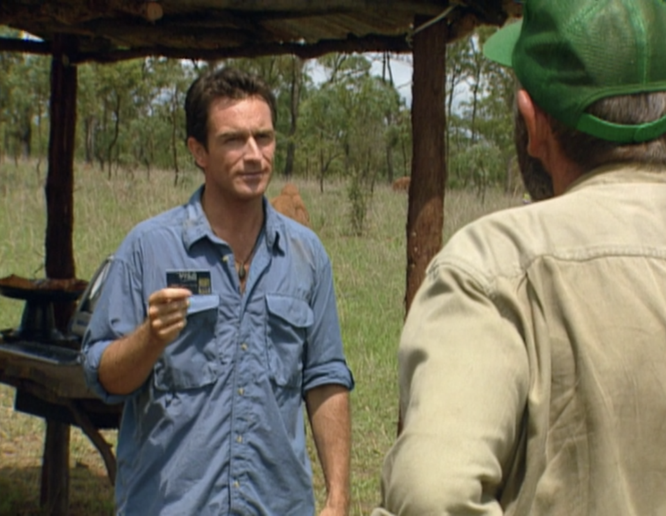 Jeff Probst holds a Visa Card