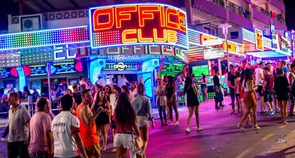 Tourists are seen enjoying the atmosphere of a local bar on Punta Ballena Street, also known as "the strip" in Mallorca, Spain. Magaluf is one of the Britain's favorite holiday destinations popular because of it's beautiful beaches, bars, and active nightlife.  (Photo by David Ramos/Getty Images)