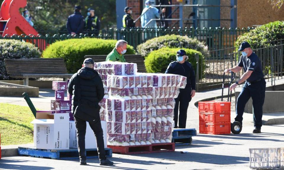 Toilet paper is distributed to residents of the Flemington block