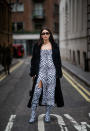 <p>Patricia Manfield was spotted outside the Halpern show in a Zebra thigh-high split dress with matching boots and micro sunnies. <em>[Photo: Getty]</em> </p>