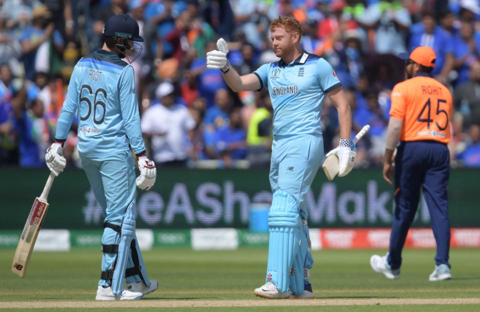 England's Jonny Bairstow (C) celebrates with teammate Joe Root after scoring a century (100 runs) during the 2019 Cricket World Cup group stage match between England and India at Edgbaston in Birmingham, central England, on June 30, 2019. (Photo by Dibyangshu Sarkar / AFP) / RESTRICTED TO EDITORIAL USE        (Photo credit should read DIBYANGSHU SARKAR/AFP/Getty Images)