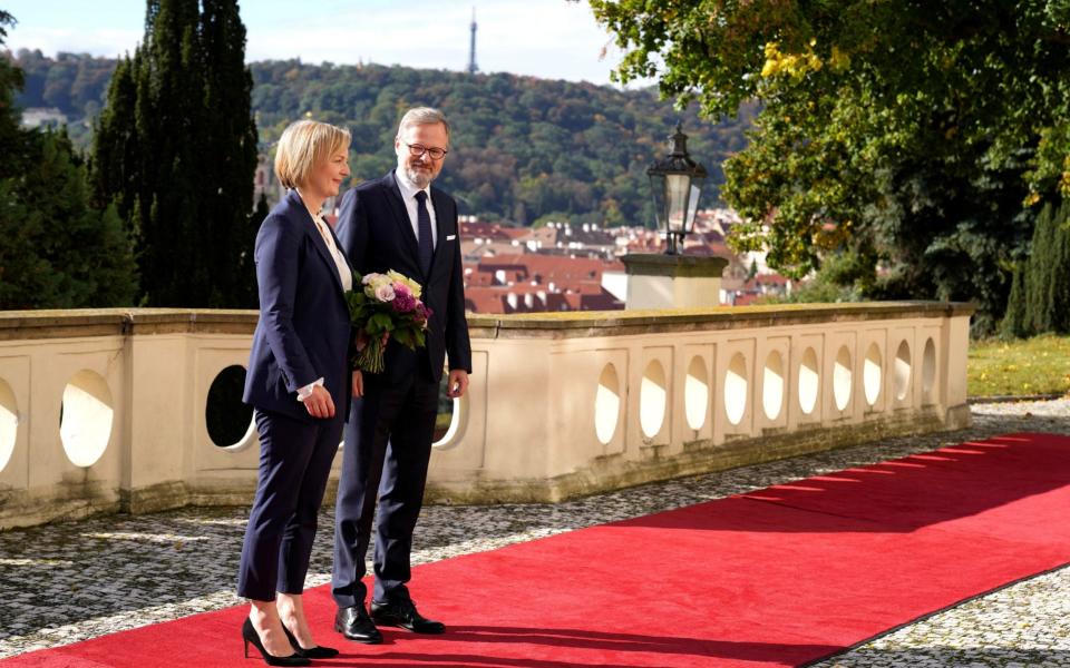 Liz Truss speaks with the Czech Republic's Prime Minister Petr Fiala prior to a meeting in Prague  - Reuters