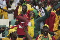 Guinea fans cheer before the start of the African Cup of Nations Round of 16 soccer match between Equatorial Guinea and Guinea, at the Olympic Stadium of Ebimpe in Abidjan, Ivory Coast, Sunday, Jan. 28, 2024. (AP Photo/Themba Hadebe)