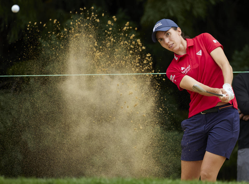 Carlota Ciganda, of Spain, hits from the bunker on the fifth hole during the final round of the LPGA Portland Classic golf tournament in Portland, Ore., Sunday, Sept. 3, 2023. (AP Photo/Craig Mitchelldyer)