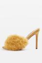 <p><a rel="nofollow noopener" href="http://www.topshop.com/en/tsuk/product/roa-faux-fur-mules-6417636?bi=40&ps=20" target="_blank" data-ylk="slk:Topshop, £49;elm:context_link;itc:0;sec:content-canvas" class="link ">Topshop, £49</a> </p>