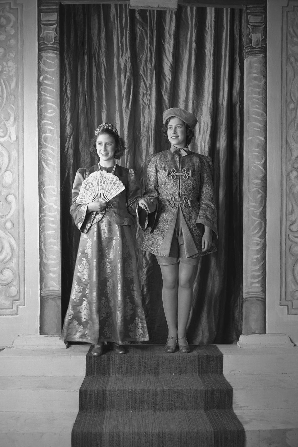 <p>Princess Margaret and Princess Elizabeth (Queen Elizabeth II) during a production of "Aladdin" at Windsor Castle. </p>