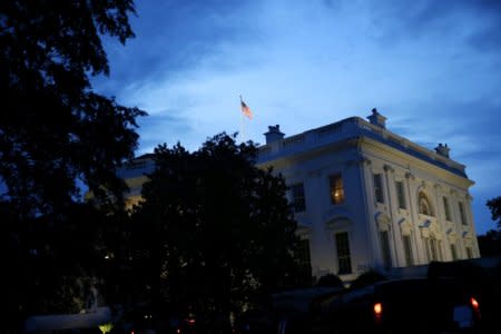 FILE PHOTO: The White House in the evening, in Washington, U.S., May 22, 2018. REUTERS/Al Drago