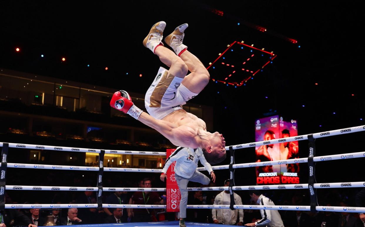 Israil Madrimov celebrates victory over Magomed Kurbanov (not pictured) with a backflip during the WBA World Super Welterweight title fight between Israil Madrimov and Magomed Kurbanov on the Knockout Chaos boxing card at the Kingdom Arena on March 08, 2024 in Riyadh, Saudi Arabia