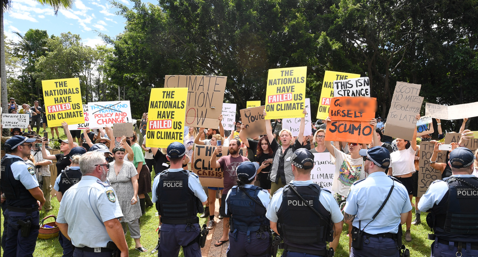 Protesters in Lismore attempted to confront Prime Minister Scott Morrison about the climate crisis. Source: AAP