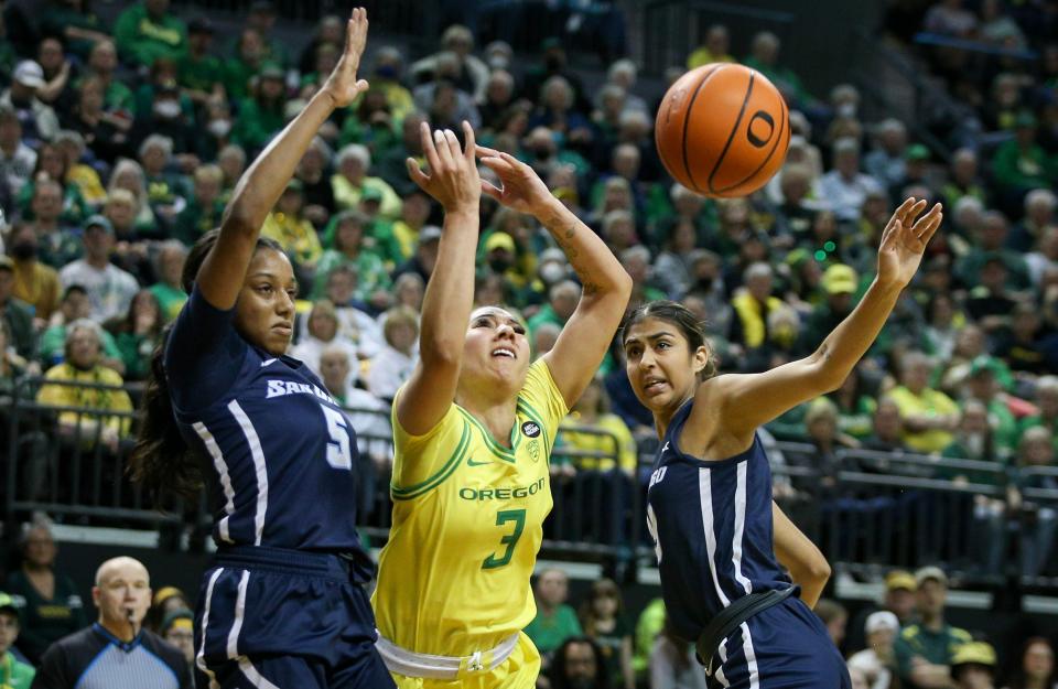Oregon guard Ahlise Hurst is fouled by San Diego forward Harsimran Kaur as the Oregon Ducks host San Diego in a WNIT matchup Thursday, March 23, 2022, at Matthew Knight Arena in Eugene, Ore.

Ncaa Womens Basketball San Diego At Oregon Wbb Wnit San Diego At Oregon