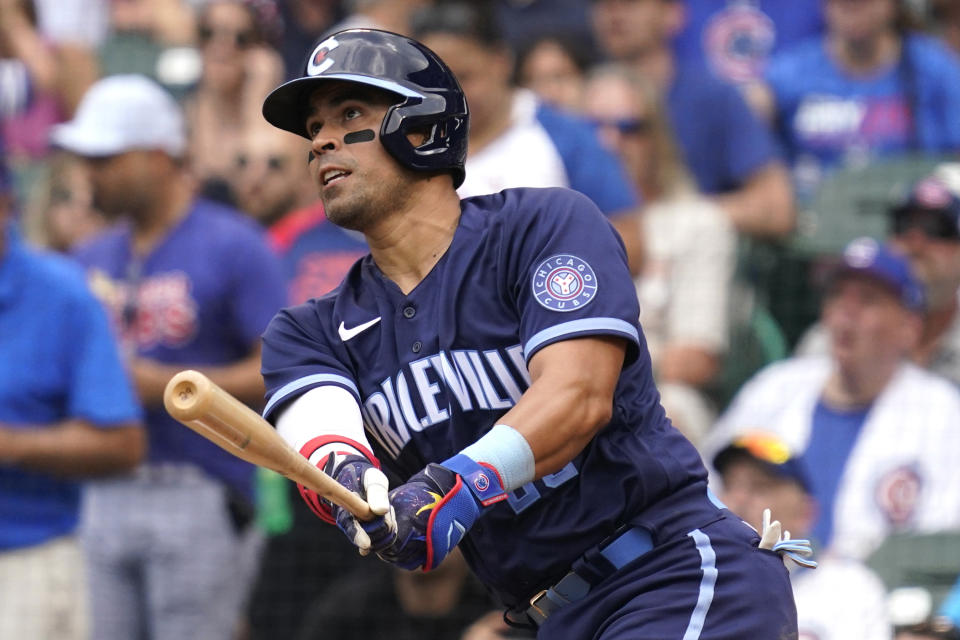 Chicago Cubs' Robinson Chirinos watches his solo home run during the fourth inning of a baseball game against the Arizona Diamondbacks in Chicago, Friday, July 23, 2021. (AP Photo/Nam Y. Huh)