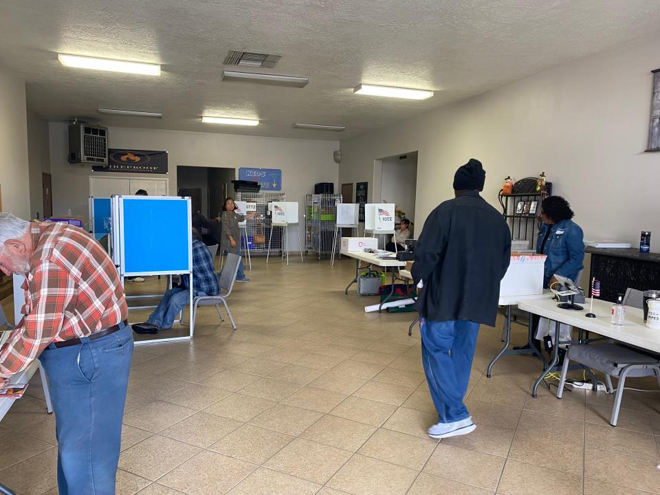 A few Barstow voters gather around 10:15 a.m. Nov. 8 to cast their ballot at a low-traffic hour of Election Day for the polling place of New Hope Village, an emergency-housing center on West Main Street.