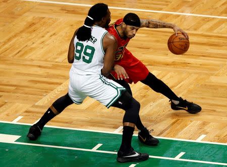 Atlanta Hawks forward Mike Scott (right) dribbles the ball against Boston Celtics forward Jae Crowder (99) during the first half in game six of the first round of the NBA Playoffs at TD Garden. Mandatory Credit: Mark L. Baer-USA TODAY Sports