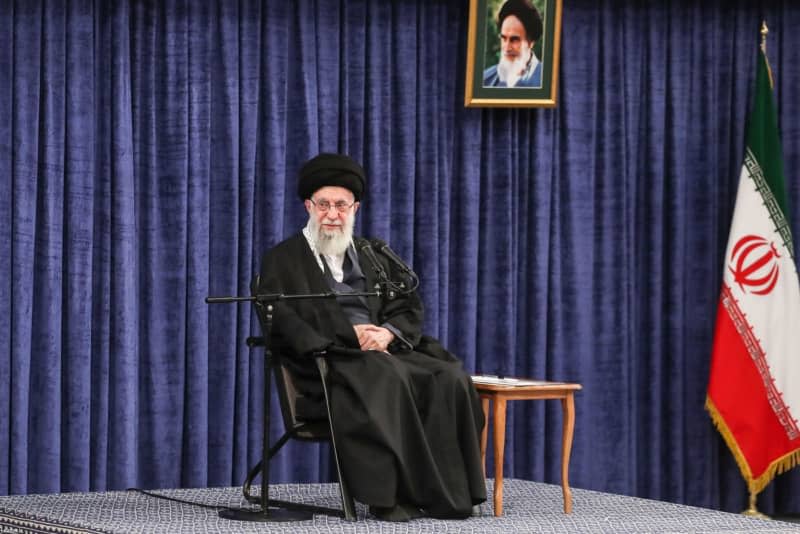 Iranian Supreme Leader Ayatollah Ali Khamenei speaks during a meeting with with politicians, the Iranian government, and military officials in Tehran. -/Iranian Supreme leader's Office/dpa