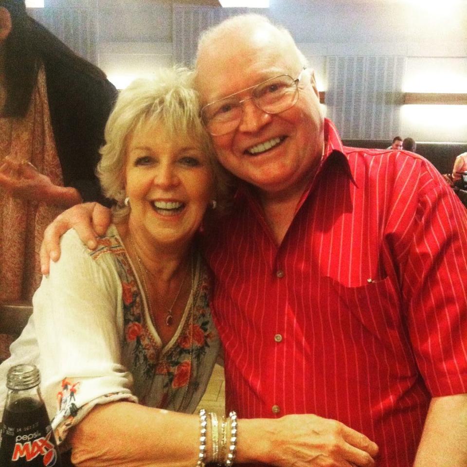 Bert Newton and Patti Newton hugging for a picture