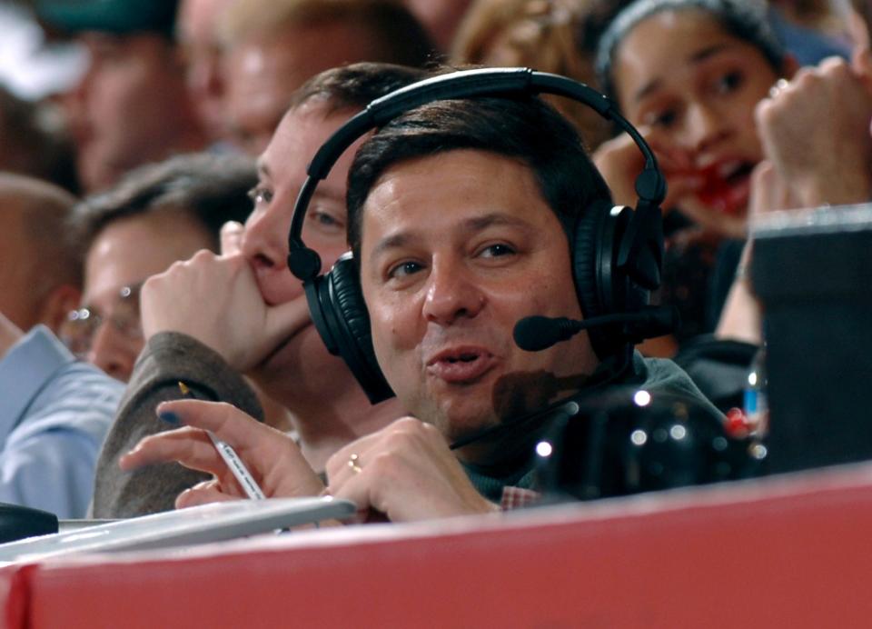 Joe Lunardi, known as "The Bracketologist," sits courtside during the men's basketball game between Saint Joseph's University and Duquense in Philadelphia, Jan. 3, 2007. Coaches lobby Lunardi, players stop by to schmooze and fans write nasty letters when their team doesn't get the seed they feel it deserves in the NCAA tournament bracket . (AP Photo/Greg Carroccio)