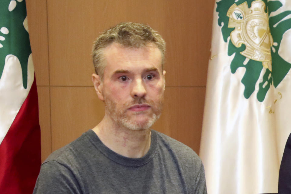 This handout photo by the Lebanese General Security Directorate, shows Canadian citizen Kristian Lee Baxter, during a press conference in Beirut, Lebanon, Friday, Aug 9, 2019. Baxter held in Syrian prisons since last year and freed after Lebanese mediation said Friday he had no idea if anyone knew he was still alive. The Lebanese general who mediated his release said Baxter was heading home. It was not clear when Baxter was released from Syria. (The Lebanese General Security Directorate via AP)