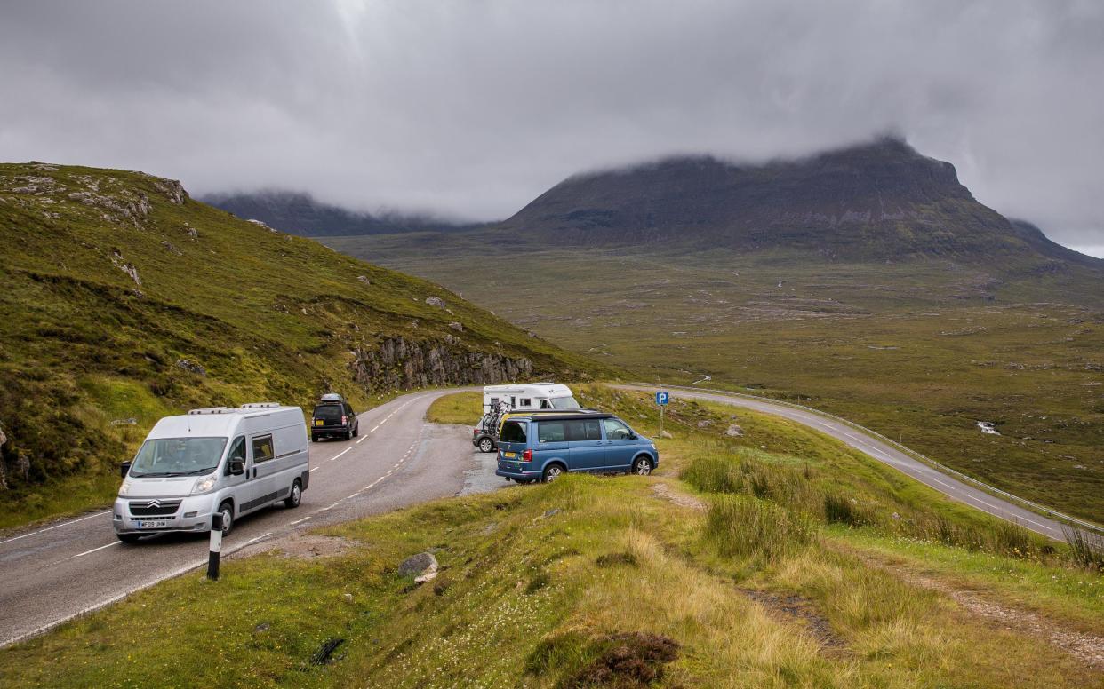 Car parks and beauty spots along the A838 are busy as tourists take to the North Coast 500 route on July 29, 2020 in Ullapool, Scotland. - Paul Campbell/2020 Getty Images