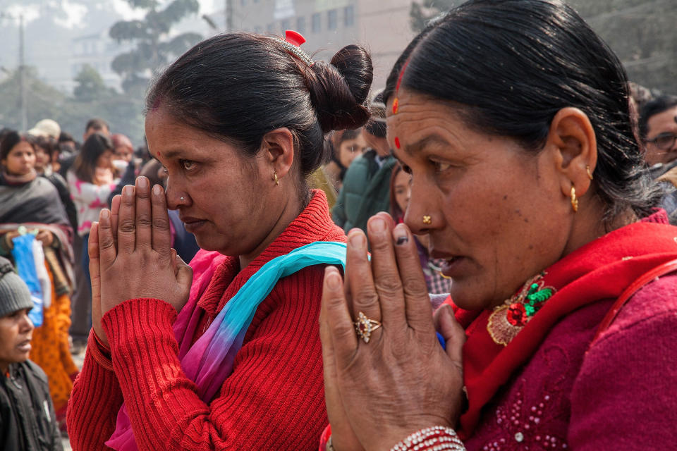 KATHMANDU, NEPAL - FEBRUARY 17:  Devotees pray in front of the Pashupatinath temple during the celebration of the Maha Shivaratri festival on February 17, 2015 in Kathmandu, Nepal. 