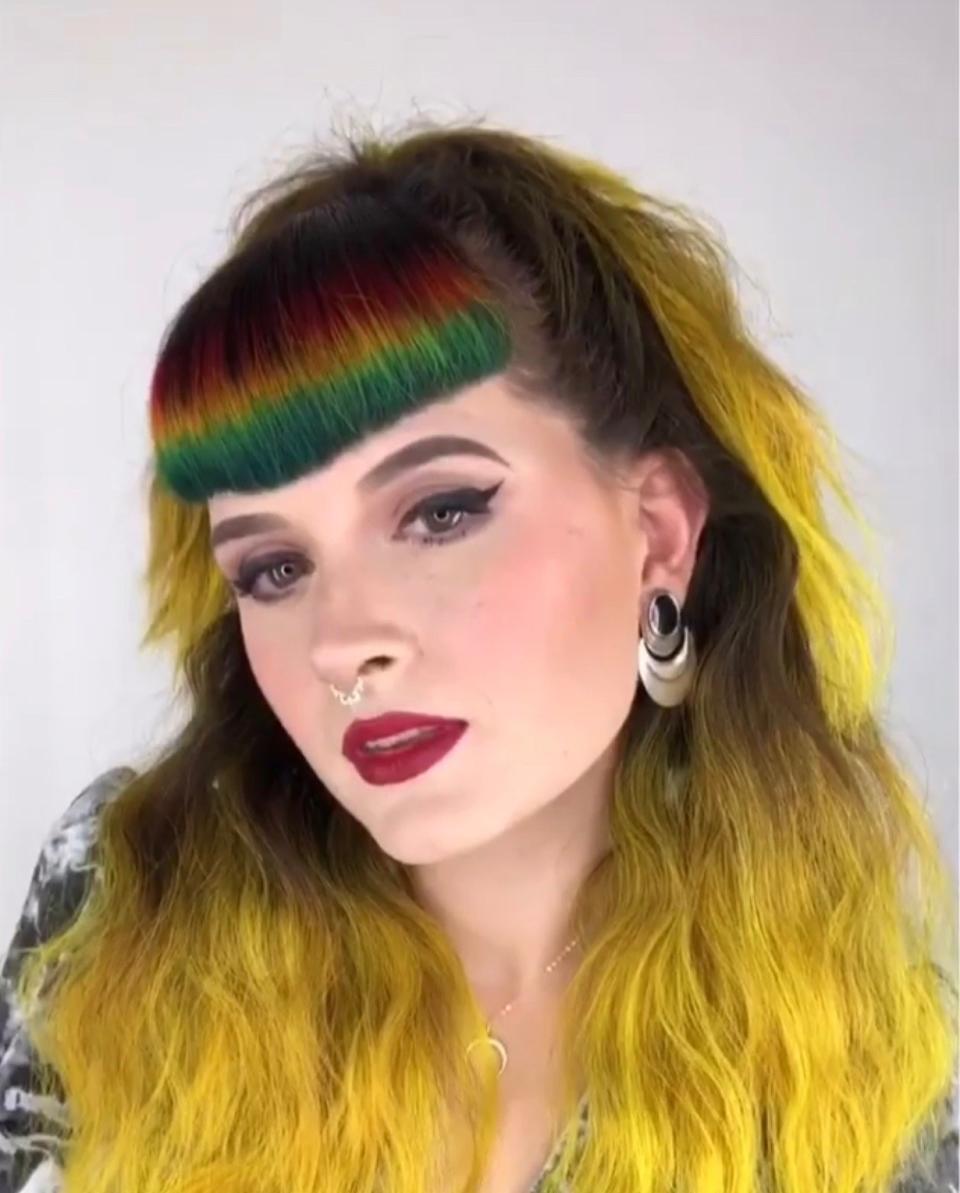 We chatted with St. Louis-based hair pro Caitlin Ford on how she mastered the creation of a rainbow bangs. See a video of her dyeing process here.