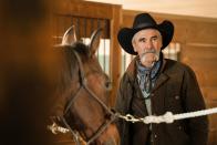 <p>Smith's real life look isn't much of a departure from playing Rip's right-hand man Lloyd—in addition to being a stuntman, the actor is also a genuine cowboy. </p>