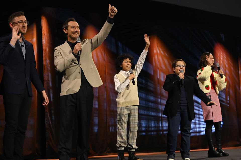 LONDON, ENGLAND - APRIL 07: (L-R) Host Ali Plumb, Jude Law, Ravi Cabot Conyers, Robert Timothy Smith and Kyrianna Kratter onstage during the studio panel for Skeleton Crew at the Star Wars Celebration 2023 in London at ExCel on April 07, 2023 in London, England. (Photo by Kate Green/Getty Images for Disney)