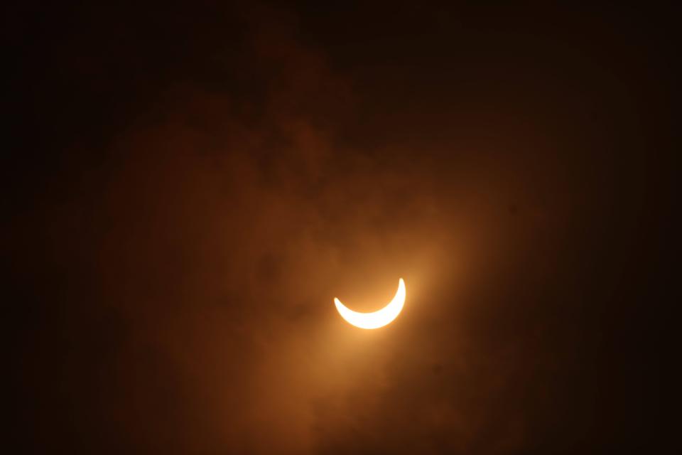 The solar eclipse as seen from the Northwest Regional Library in Cape Coral. Southwest Florida saw 78 percent of the sun covered as moon crossed its path at 2:53 p.m. Monday, Aug. 21, 2017.