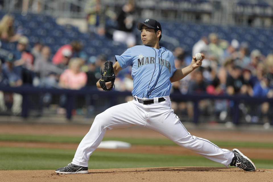 Seattle Mariners' Yusei Kikuchi throws during the first inning of a spring training baseball game against the Cincinnati Reds, Monday, Feb. 25, 2019, in Peoria, Ariz. (AP Photo/Darron Cummings)