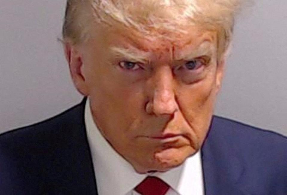 Trump’s notorious booking mugshot released by the Fulton County Sheriff's Office on August 24 2023 (Reuters)