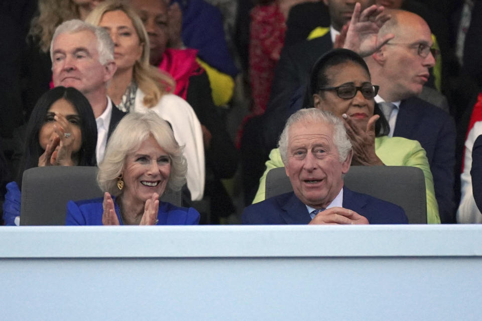 King Charles III and Queen Camilla in the Royal Box during the concert at Windsor Castle in Windsor, England, Sunday, May 7, 2023, celebrating the coronation of King Charles III. It is one of several events over a three-day weekend of celebrations. (Yui Mok/Pool Photo via AP)