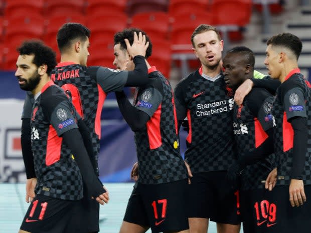 <p>Sadio Mane of Liverpool celebrates with teammates</p> (Getty)