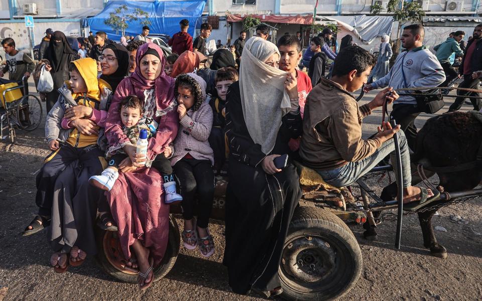 Thousands of displaced Palestinians go to check on their homes