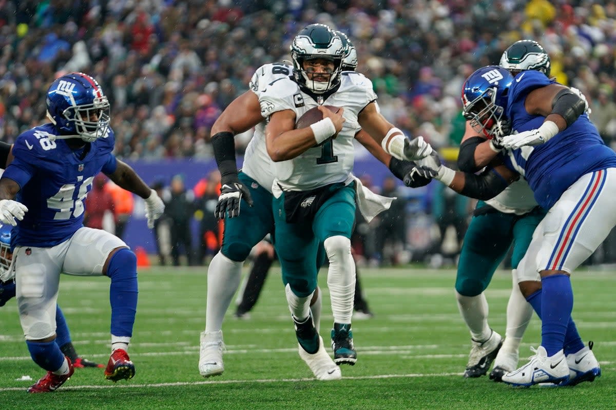 Philadelphia Eagles quarterback Jalen Hurts threw for 217 yards and ran in for a touchdown himself (Bryan Woolston/AP) (AP)