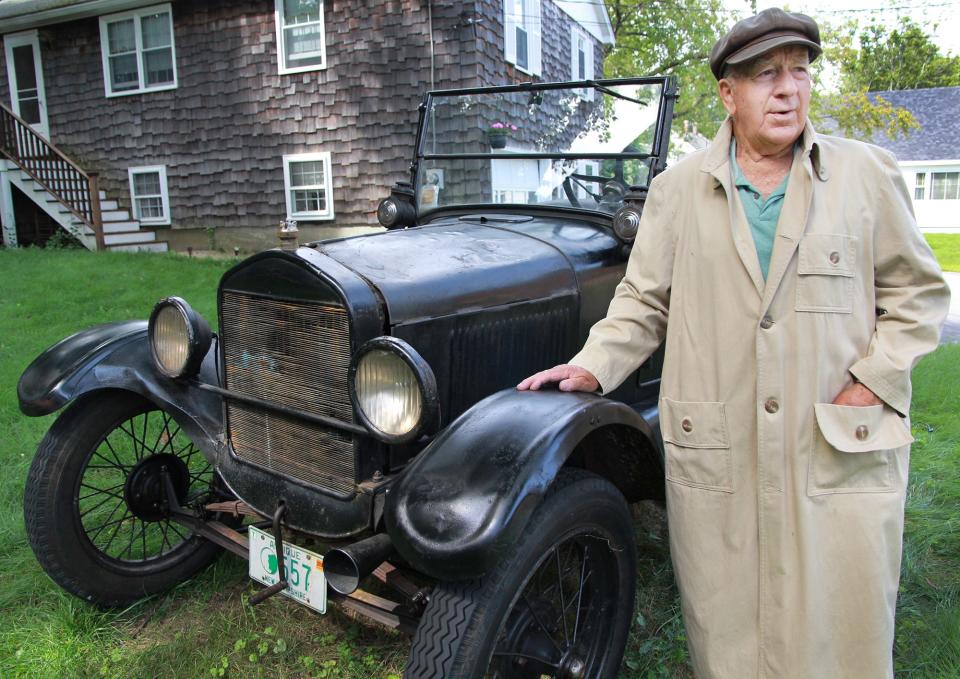 Porstmouth's Harold Whitehouse prepares in 2013 to lead a parade across the new Memorial Bridge connecting Portsmouth and Kittery, Maine, in his 1926 Model T Ford.