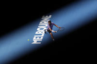 <p>Switzerland’s Stan Wawrinka makes a backhand return to Canada’s Milos Raonic during their second round match at the Australian Open tennis championships in Melbourne, Australia, Thursday, Jan. 17, 2019. (AP Photo/Aaron Favila) </p>