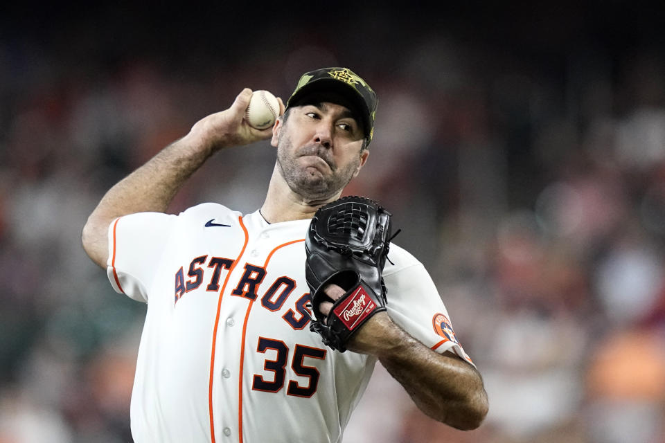 Houston Astros starting pitcher Justin Verlander throws during the first inning of a baseball game against the Texas Rangers Saturday, May 21, 2022, in Houston. (AP Photo/David J. Phillip)