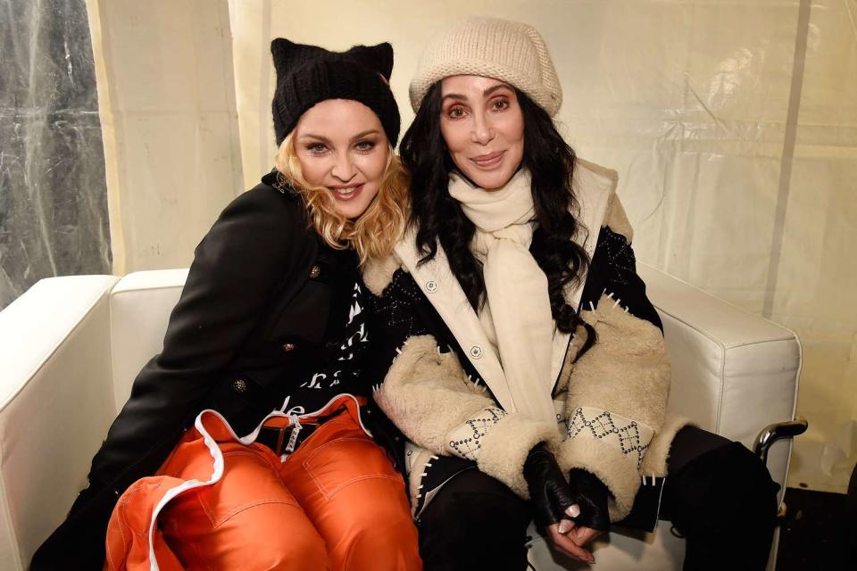 <p>Kevin Mazur/WireImage</p> Madonna and Cher in Washington DC in January 2017