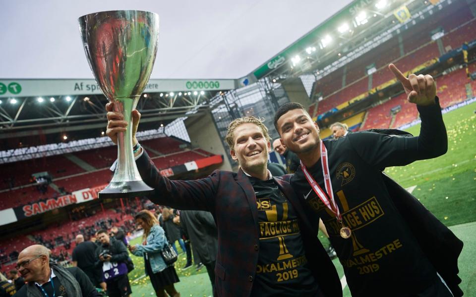 Rasmus Ankersen, president of FC Midtjylland and Evander Ferreira of FC Midtjylland celebrate after the Danish Cup Final  - GETTY IMAGES