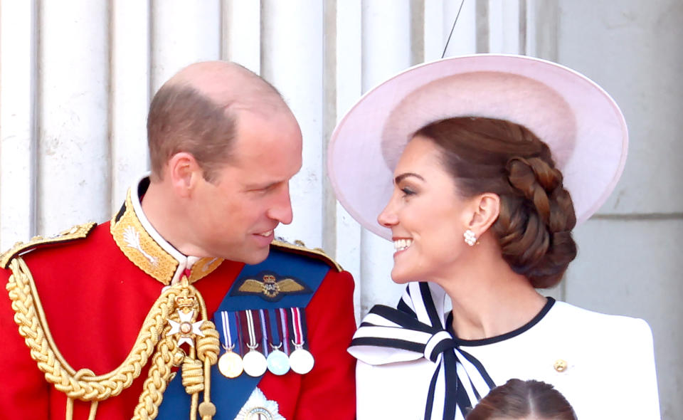 LONDON, ENGLAND - JUNE 15: Prince William, Prince of Wales and Catherine, Princess of Wales on the balcony during Trooping the Colour at Buckingham Palace on June 15, 2024 in London, England. Trooping the Colour is a ceremonial parade celebrating the official birthday of the British Monarch. The event features over 1,400 soldiers and officers, accompanied by 200 horses. More than 400 musicians from ten different bands and Corps of Drums march and perform in perfect harmony. (Photo by Chris Jackson/Getty Images)