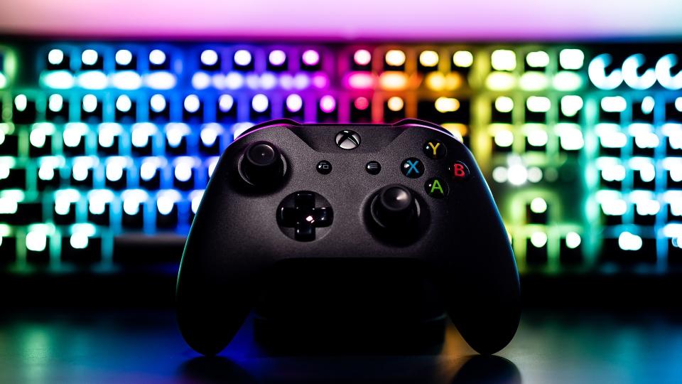 Xbox One Controller in front of an RGB keyboard