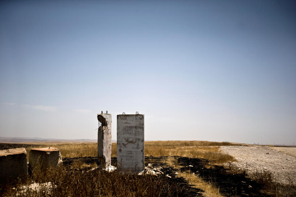 Concrete blast walls are seen in an open area once used by the Israeli military near Rahat, southern Israel, June 3, 2019. Once part of a facility for training in urban warfare, the barriers are now an isolated scar on the landscape. (Photo: Ronen Zvulun/Reuters)