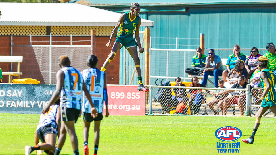 Shane Inkamala, pictured here in action on the footy field.