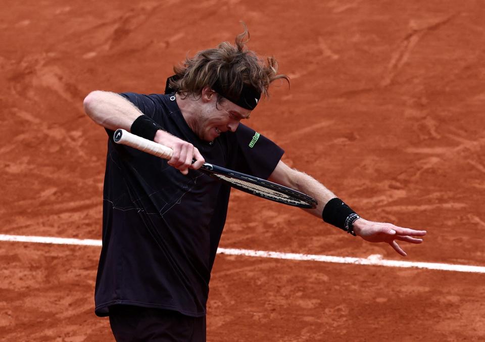 Andrey Rublev reacts during his third-round match against Italy’s Matteo Arnaldi (Reuters)