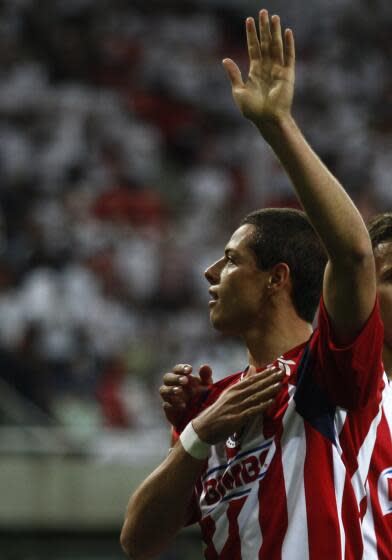 Mexico's Chivas' Javier Hernadez "Chicharito" celebrates a goal against England's Manchester United during a friendly soccer match in Guadalajara, Mexico, Friday July 30, 2010. (AP Photo/Claudio Cruz)