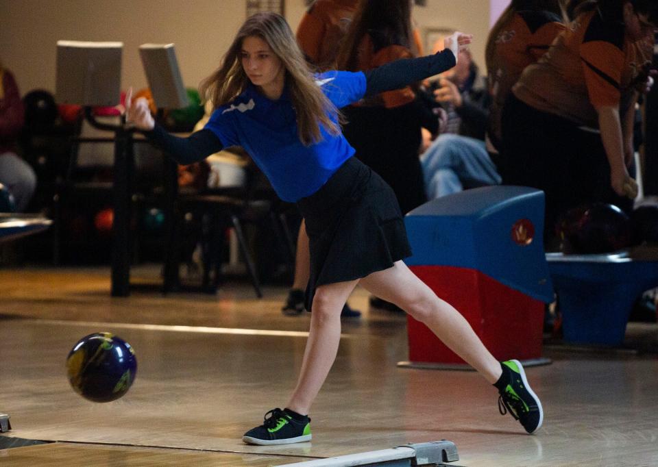 Lakewood sophomore Vica Pletcher throws the ball down the lane as Lakewood hosted New Lexington in a bowling match up at Village Lanes in Thornville, Ohio on January 27, 2022.